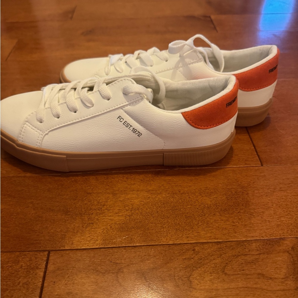 French Connection sneakers with orange detail on the back. Size 8.5, never worn